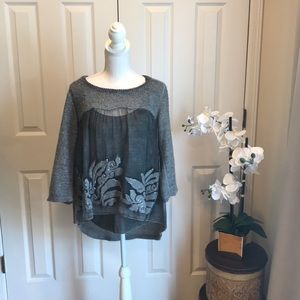 Super cute boho layered sweater.